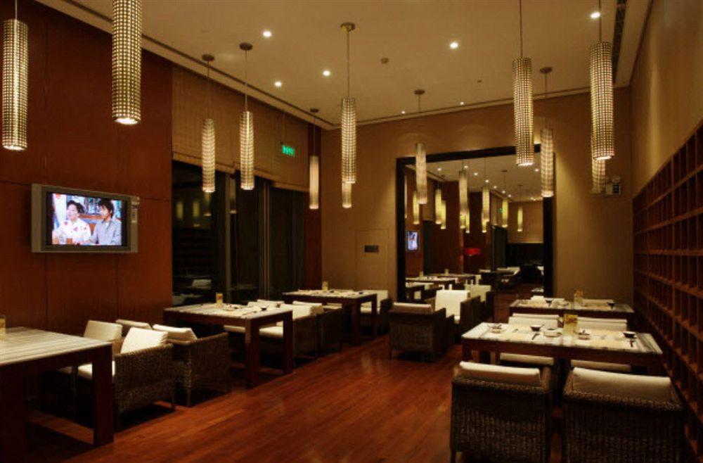 Howard Johnson Plaza Lingang Shanghai Nanhui Exterior photo